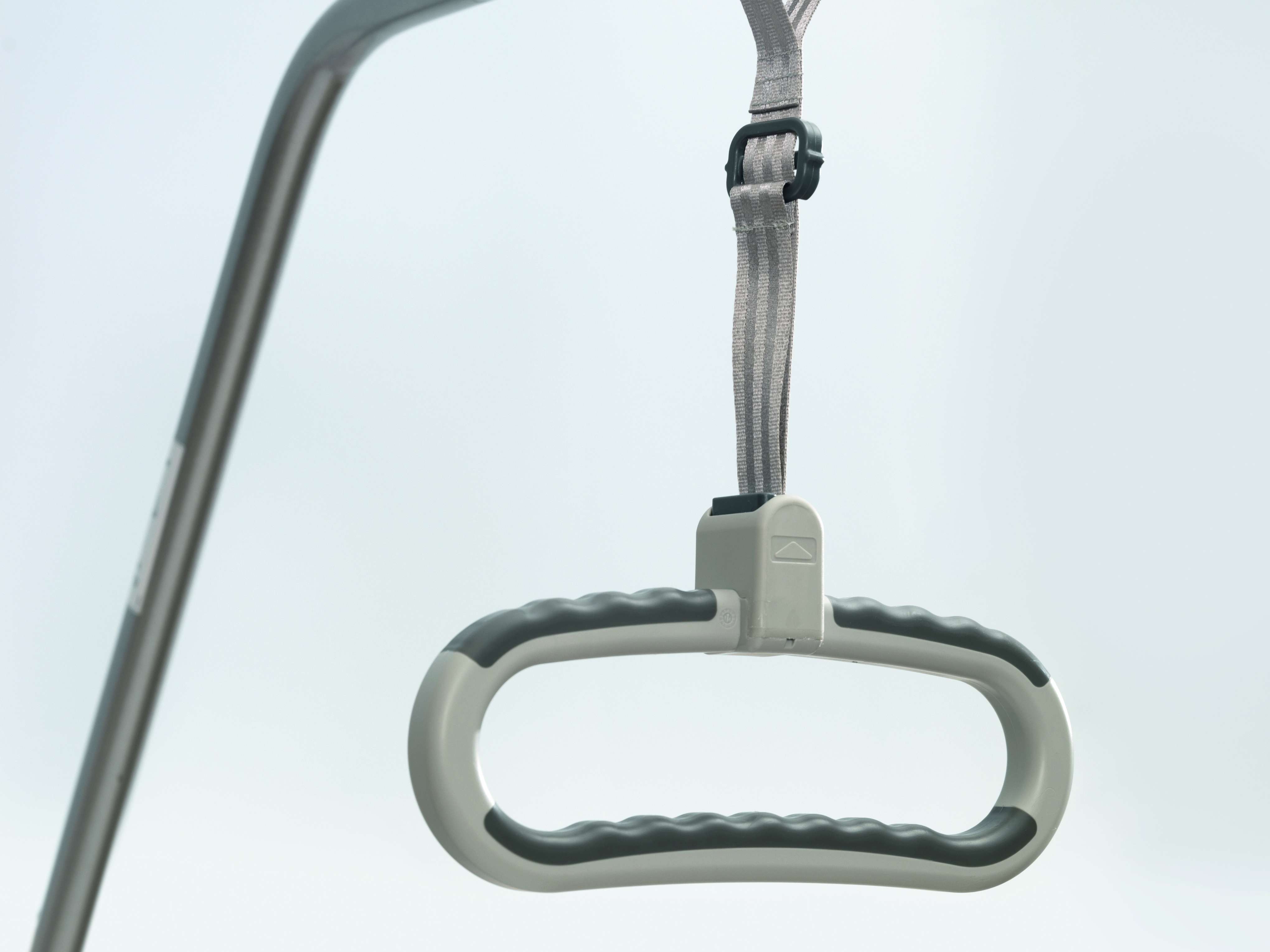 Patient lifting pole with the soft-touch grab handle