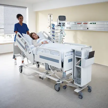 Caregiver moves Evario one Hospital bed with good driving characteristics