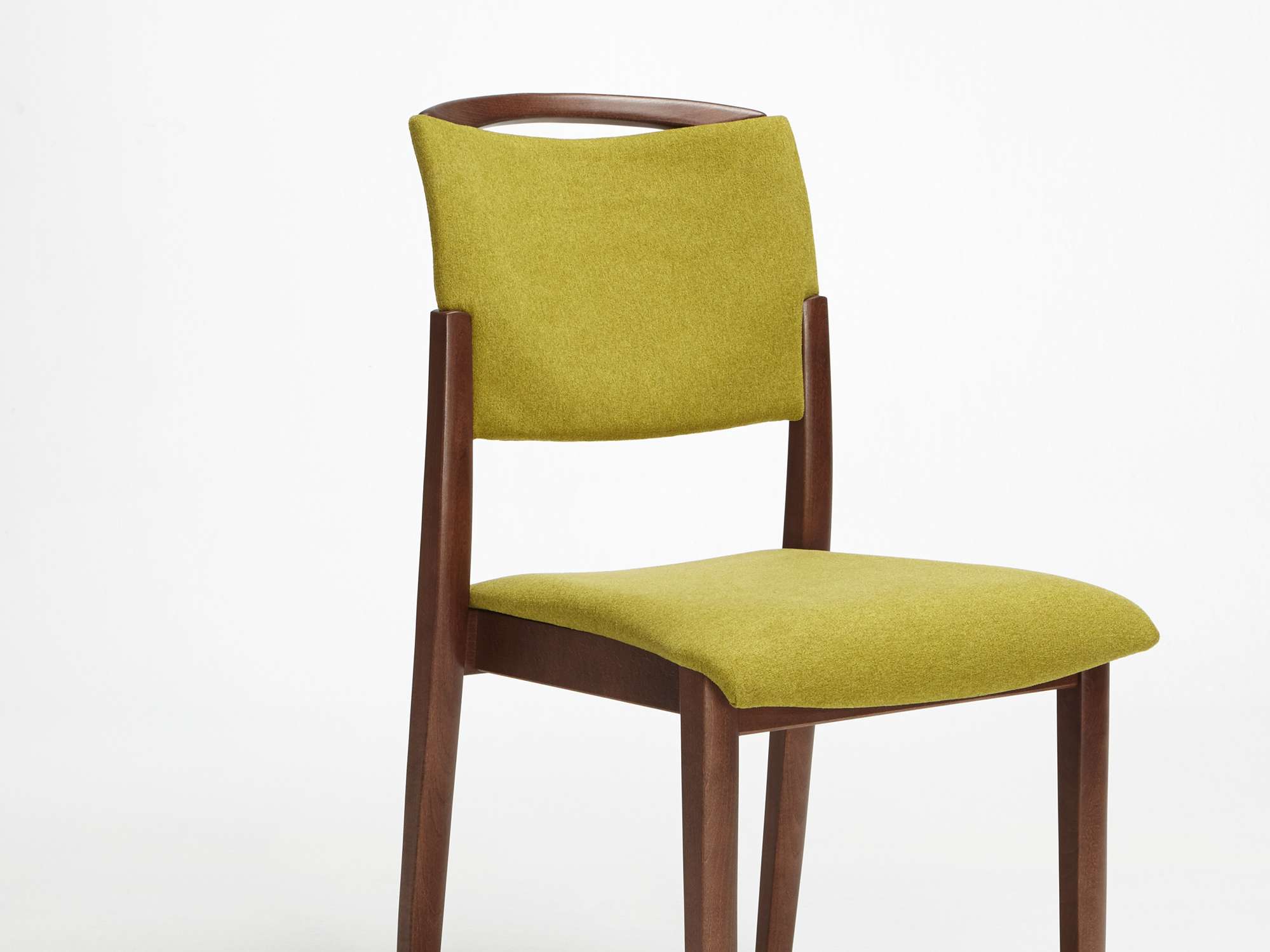 The Fena model as a stacking chair with handle and no armrests