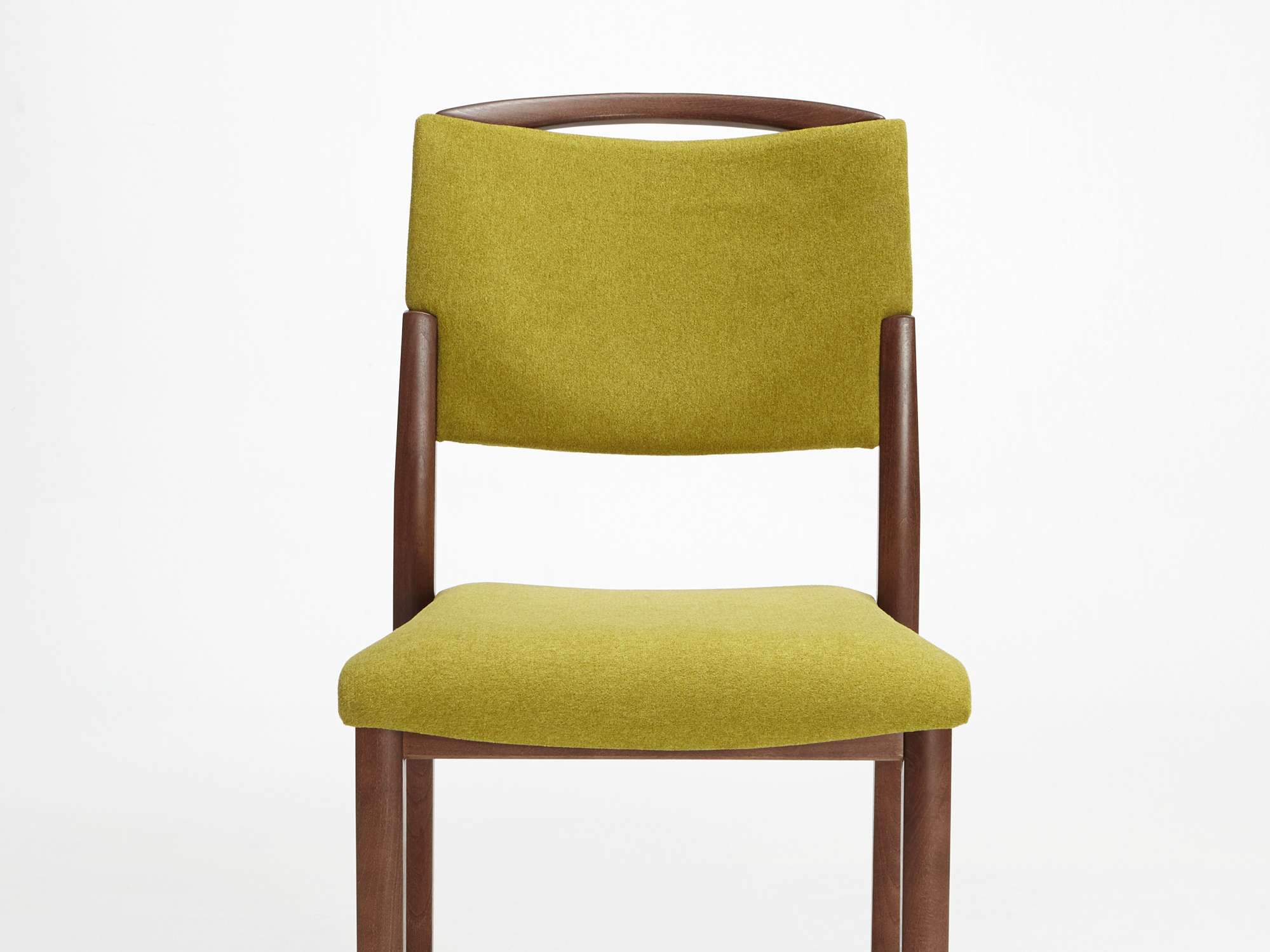 The Fena model as a stacking chair with handle and no armrests