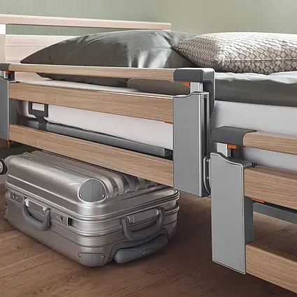 Elvido vervo Pflegebett mit Vario-Safe Seitensicherung und Schutz bei blockierter Höhenverstellung.