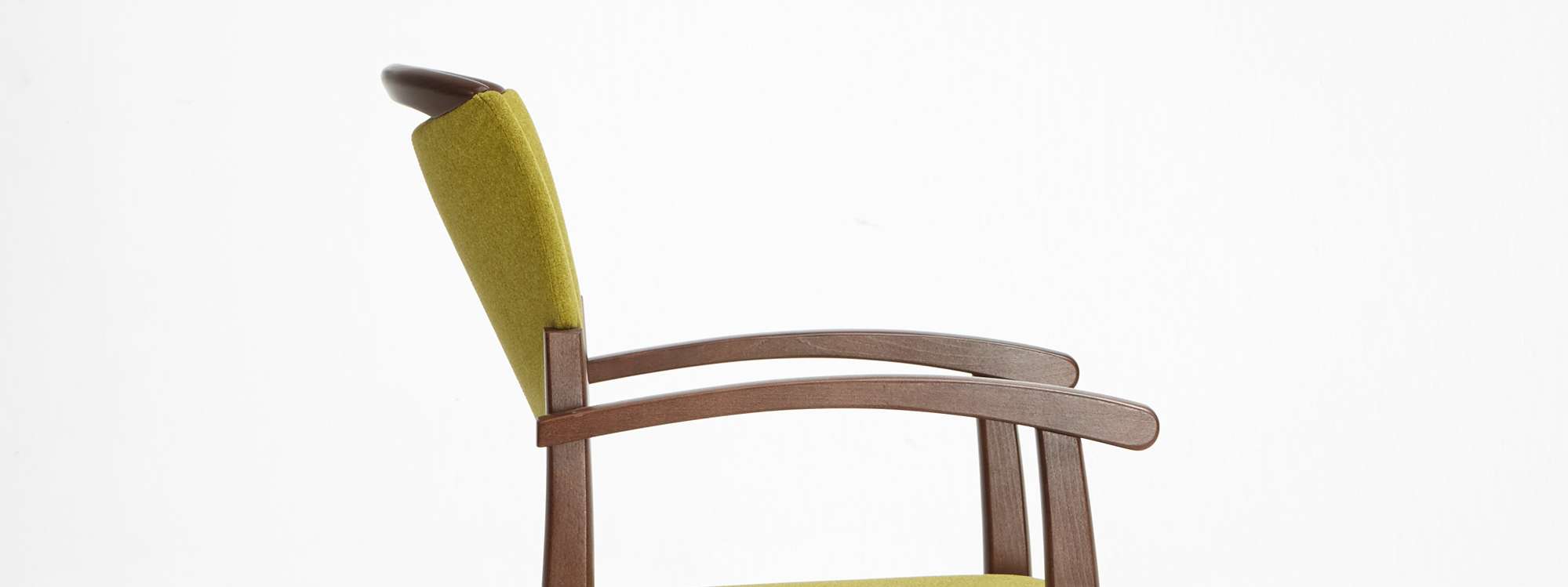The Fena model as a stackable chair with armrests and handle rail